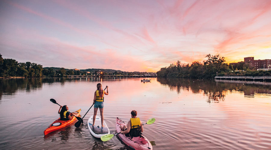 A group kayaking on river in DC