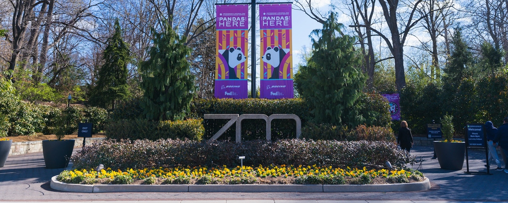 Entrance to the Smithsonian National Zoo with banners announcing pandas.